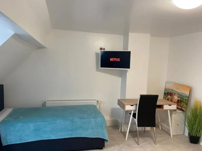Dachgeschoss 1-Zimmer Apartment Ring Schlafzimmer